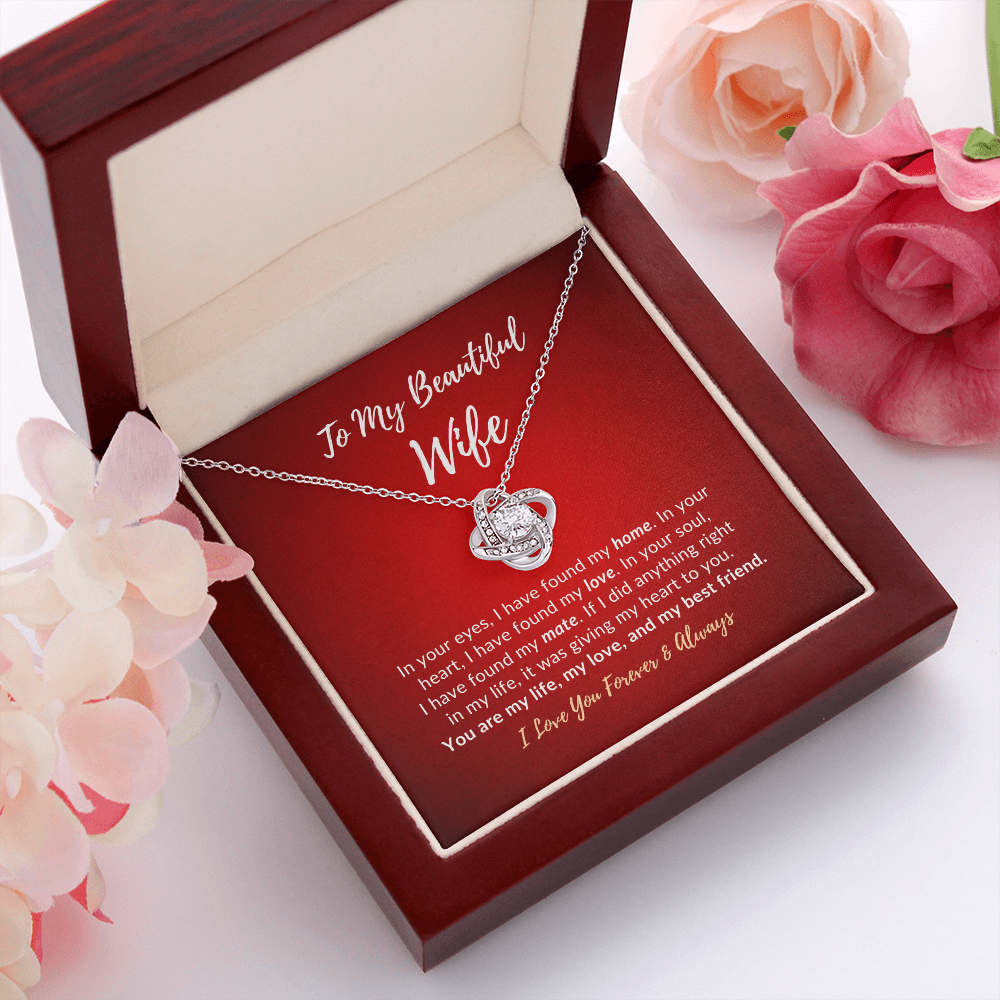 To my beautiful wife necklace in luxury box with flowers next to it