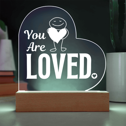 You are loved cordless plaque on a table