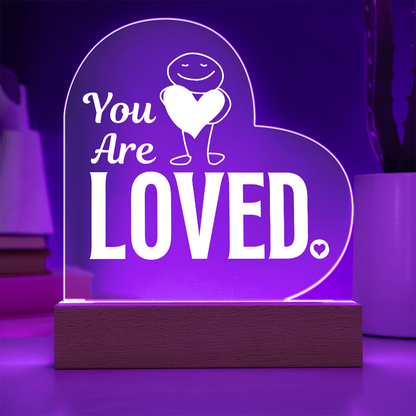You are loved plaque showing purple light feature