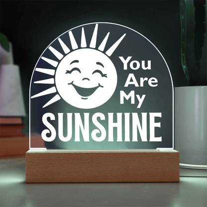 You are my sunshine plaque on a table with a cord
